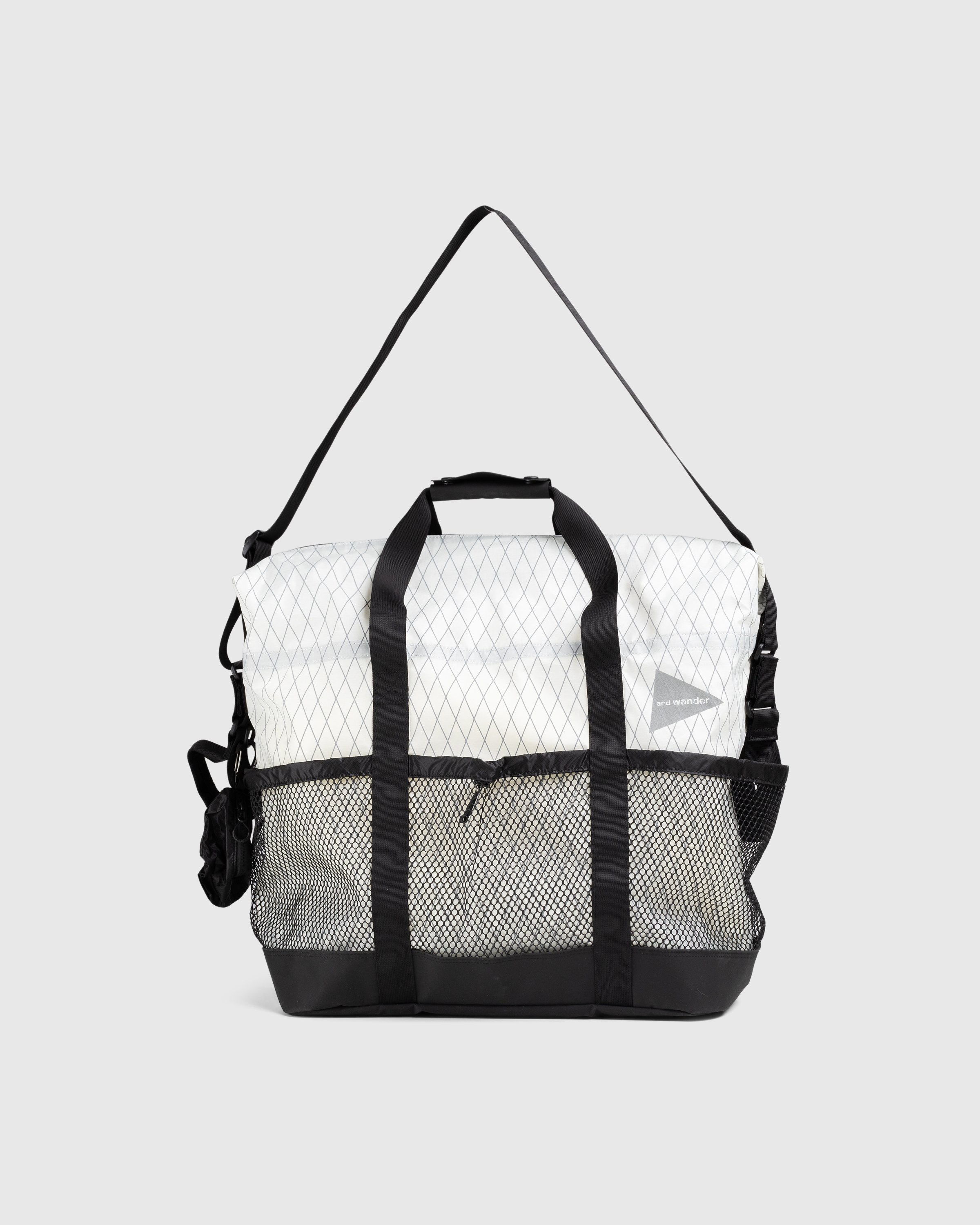 And Wander – X-Pac 45L Tote Bag Off White | Highsnobiety Shop